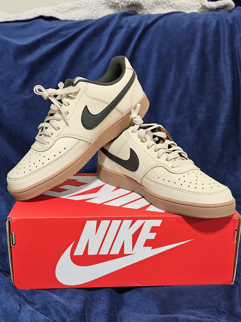 Nike Men’s Low-Top Casual Sneakers in Cream with Black Swoosh